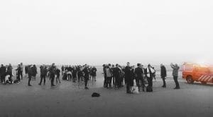 medewerkers landal op het strand